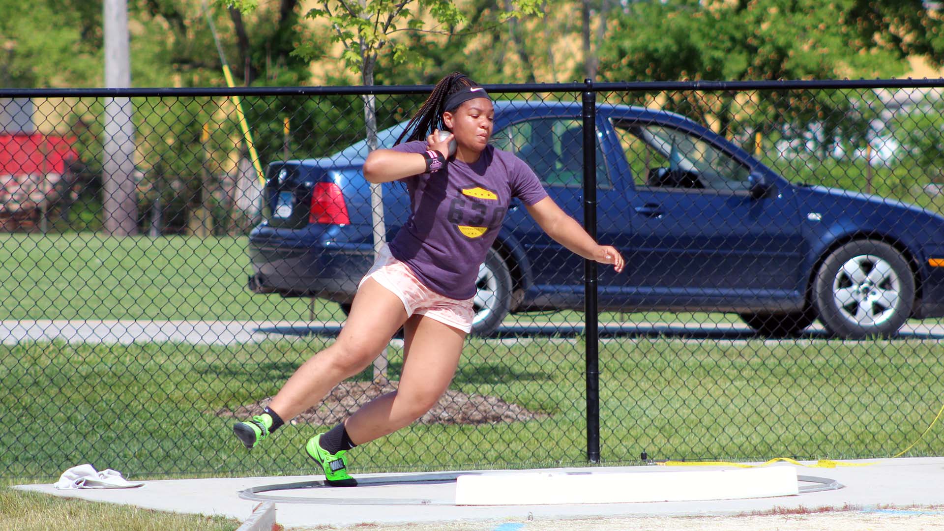 Ella O'Neall competes in the Shot Put
